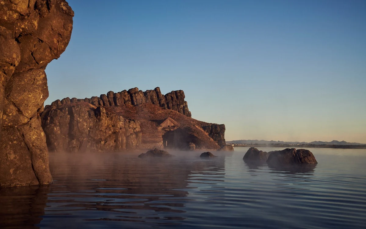 An oceanside geothermal pool at the edge of Reykjavik with the Atlantic beyond its rim